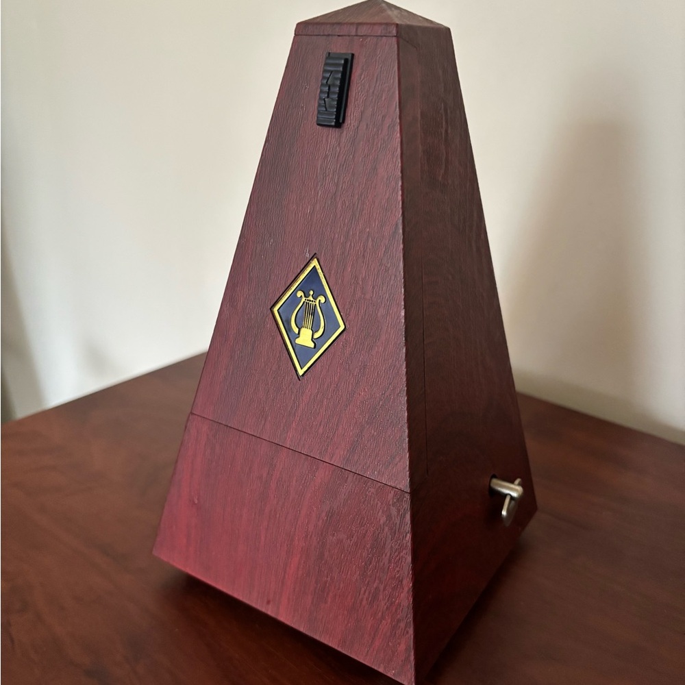 Wooden Pyramid Metronome with Yellow Emblem